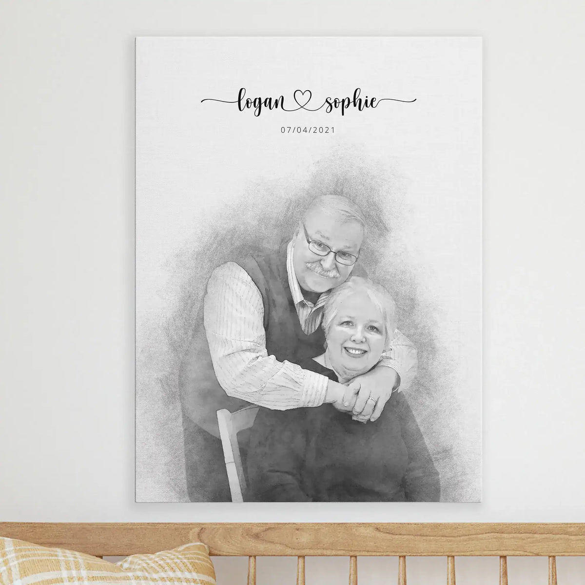 Sketch-style portrait of an older couple embracing, their names and a date above, on canvas