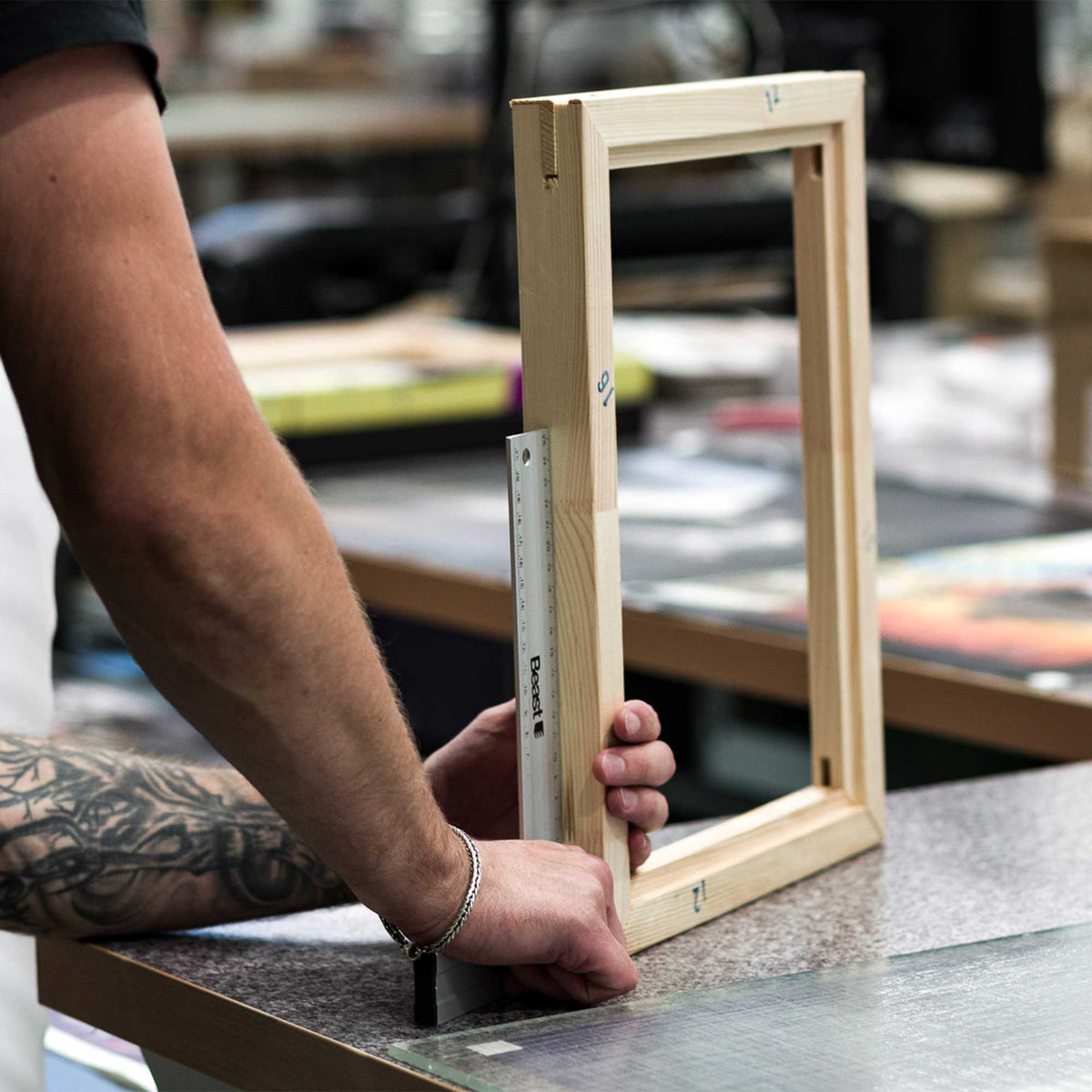 Squaring up a wooden frame on a workbench