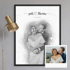 Black-framed sketch-style portrait of a laughing couple embracing, beside its reference photo, names and a date above